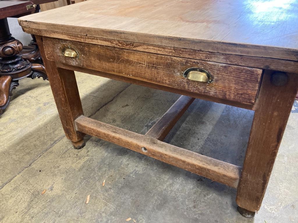 A large Victorian pine kitchen table